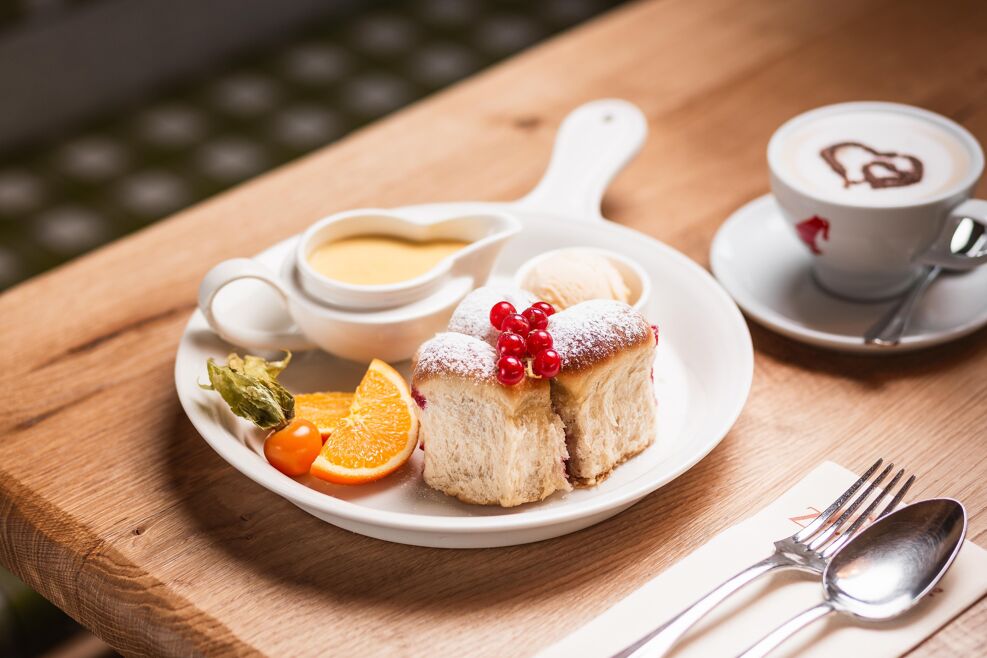 Austrian dessert "Buchteln" with vanilla sauce, Zirbenhütte in Fiss