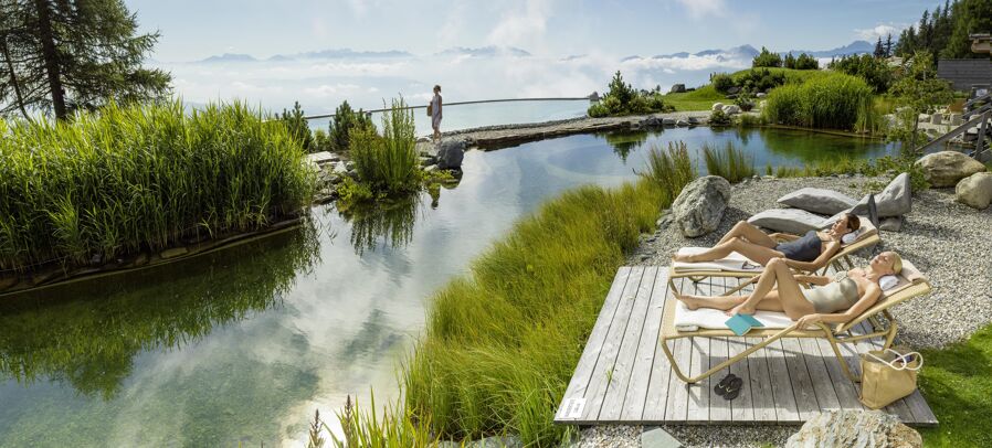 Regeneration on the garden terrace at the natural swimming lake, Feuerberg Mountain Resort