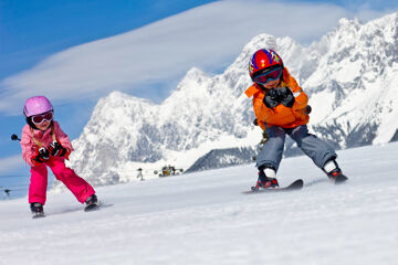 Children on the slopes, skiing in Styria