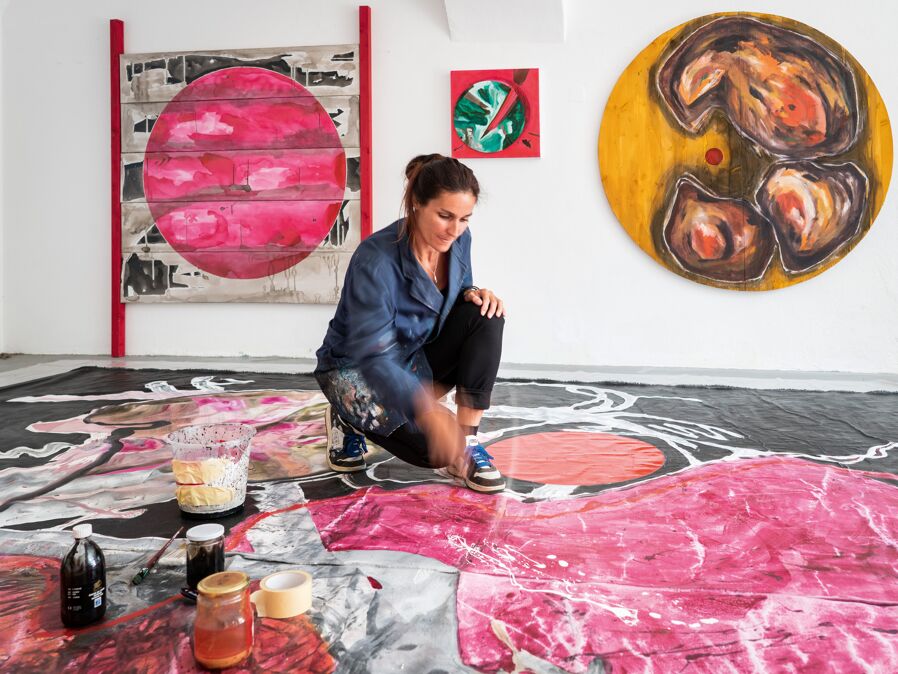 Larissa Tomassetti works in her studio in the artists' town of Gmünd