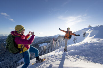 Having fun on the mountain while snowshoeing