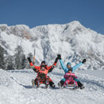 Winter in the Hochkönig region, family tobogganing